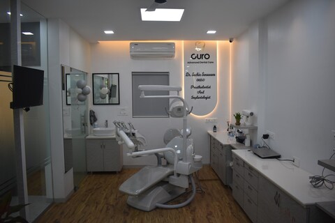 Dental treatment room with dental chair, equipment and cabinetry